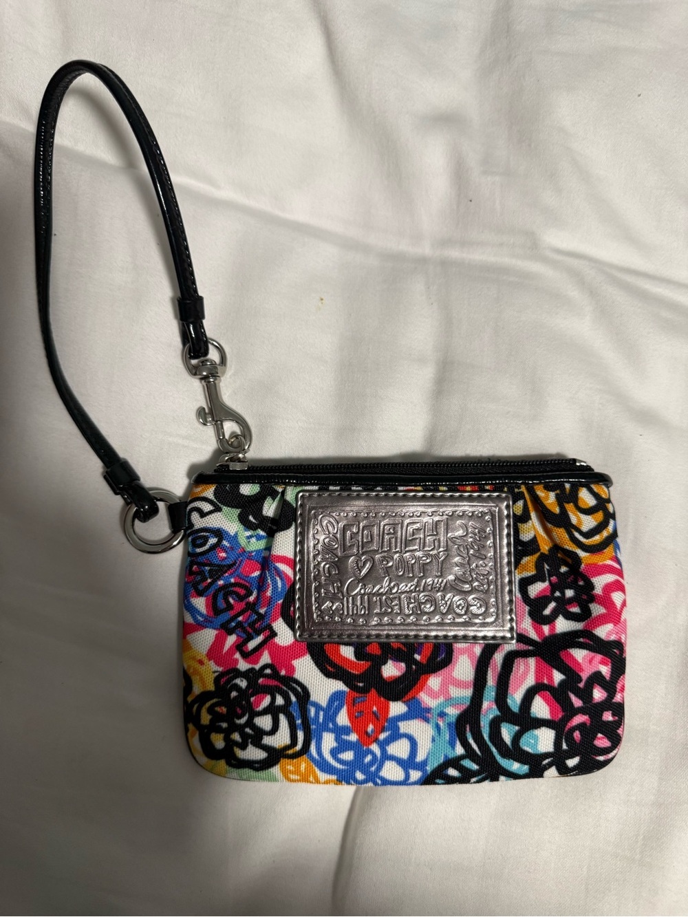 Coach Poppy Multicolor Floral Canvas Wristlet with Black Strap. Like New!